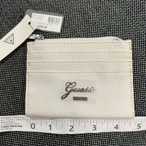 Guess Coin purse with zipper for coins and total of 4 card slots